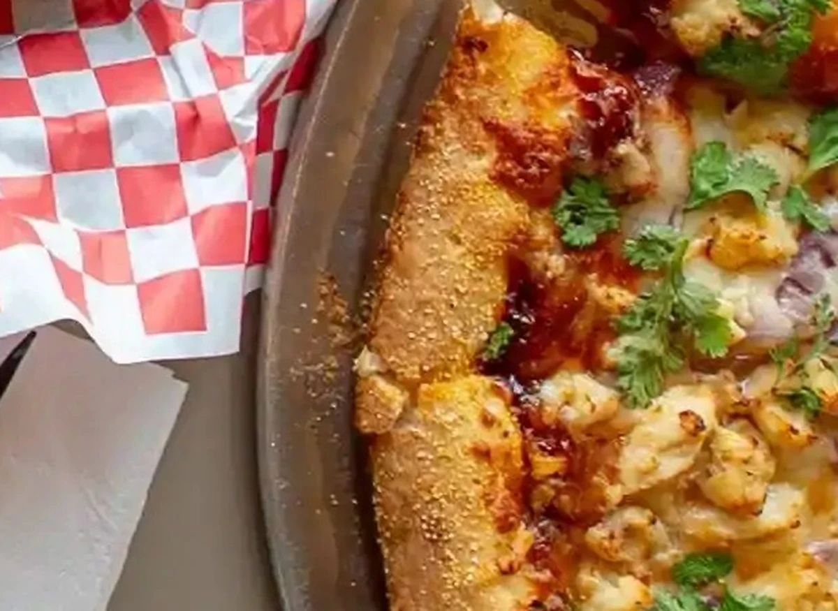 Specialty pizza loaded with fresh toppings at Basile's 2 For 1 Pizza & Pasta in Beaumont, AB