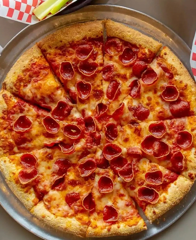 Pepperoni and cheese pizza at Basile's Beaumont